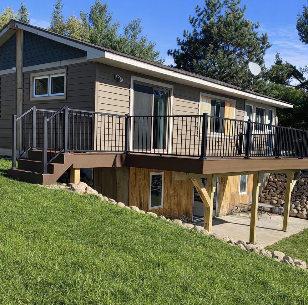 Elevated backyard deck and railing installation in Huntsville Alabama by All Seasons Remodeling and Construction