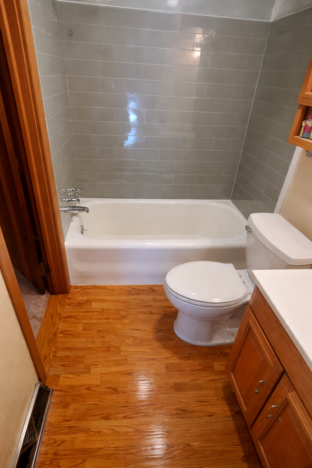 Tub surround tile installation with updated fixtures in Huntsville Alabama