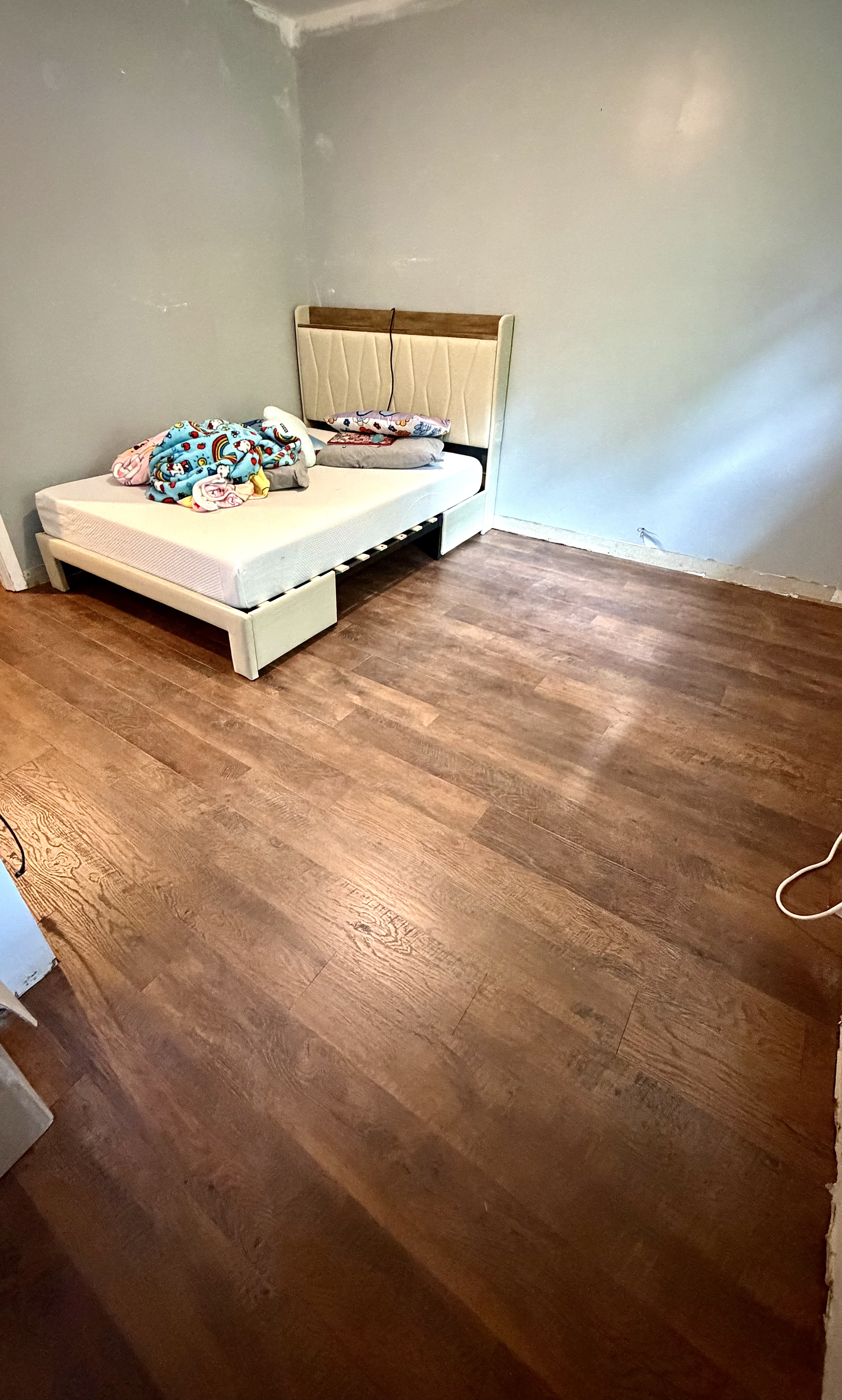 Laminate flooring installation with transitions and stair nosing in Huntsville Alabama
