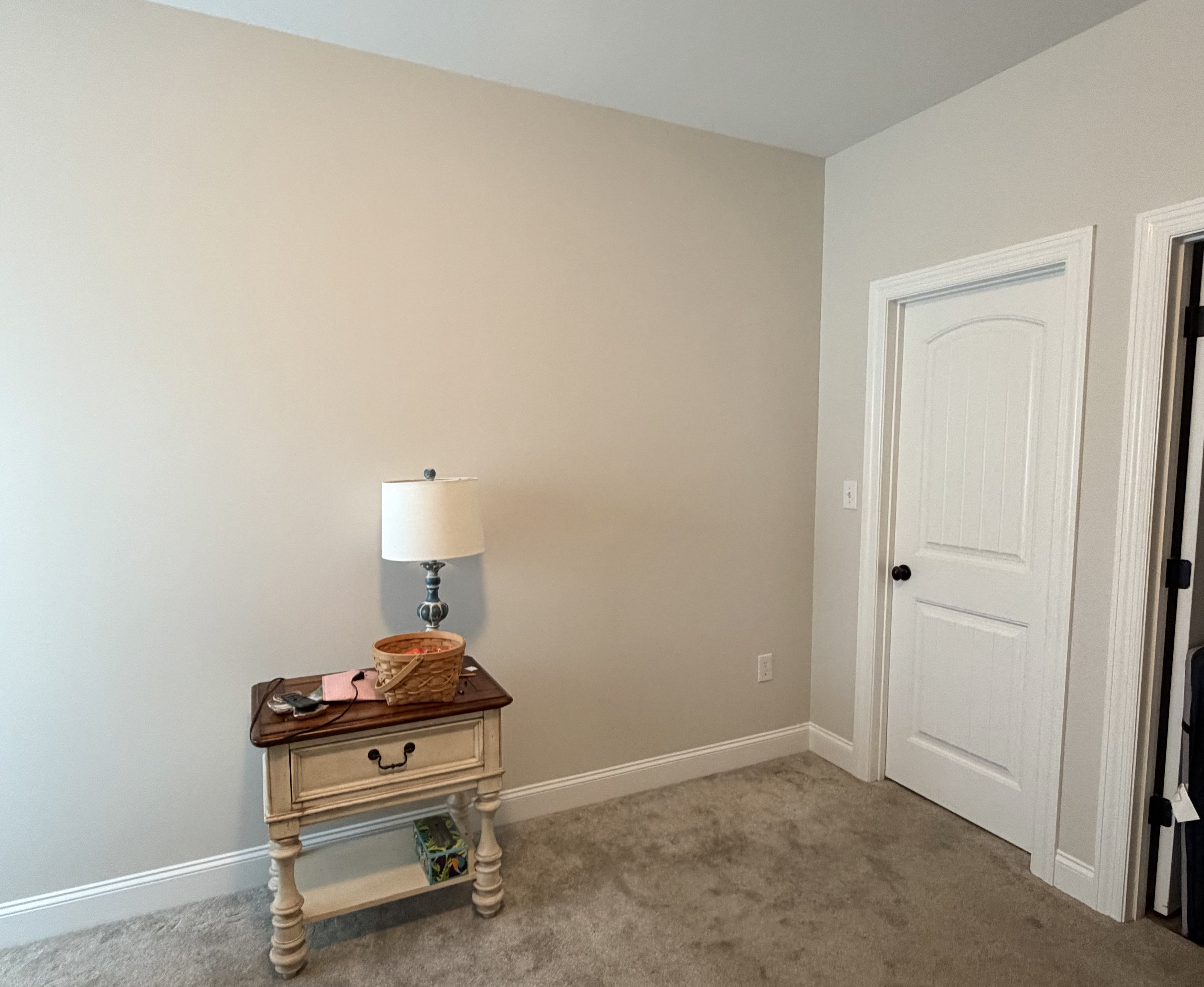 Water damaged wall repair with drywall replacement insulation baseboard replacement and interior painting in Huntsville Alabama