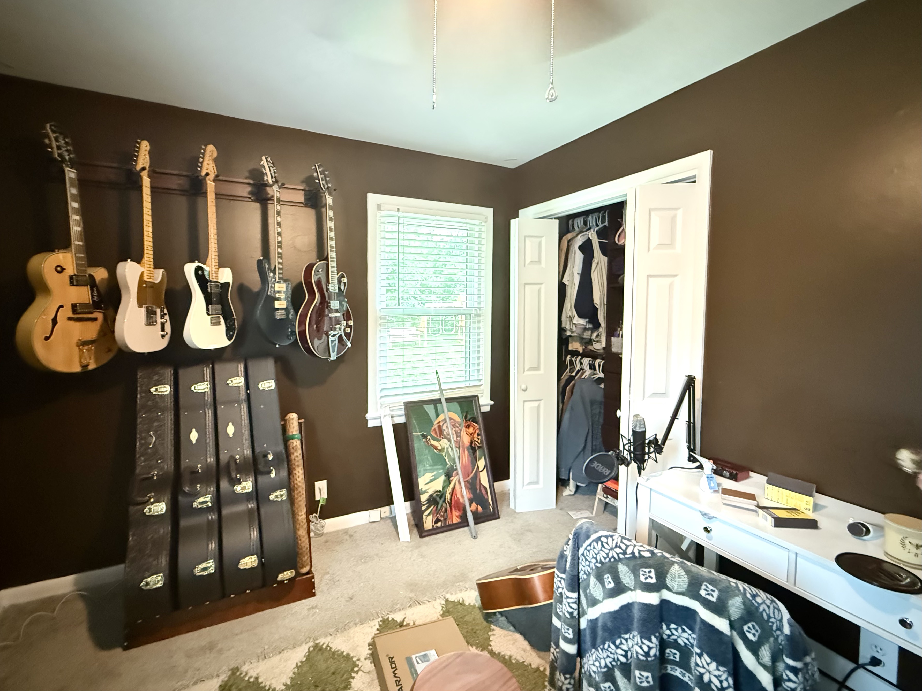 Music room wall repair adhesive removal primer and dark brown interior painting in Huntsville Alabama