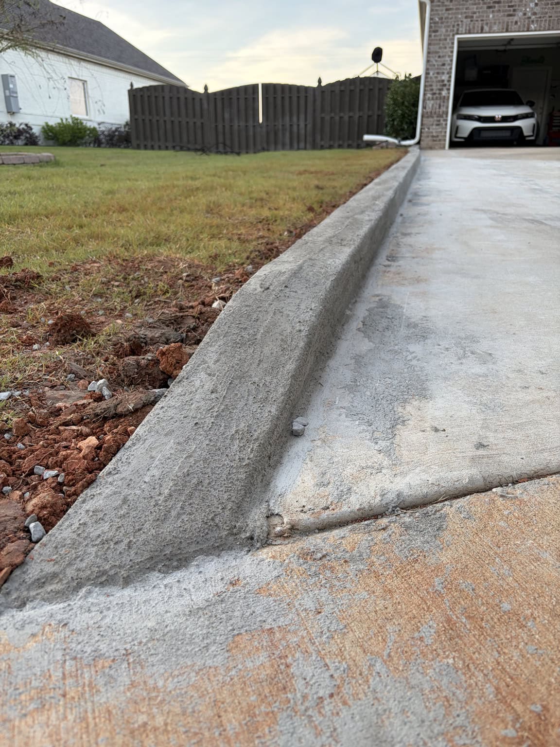 Concrete drainage berm and equipment pad installation in Owens Cross Roads Alabama