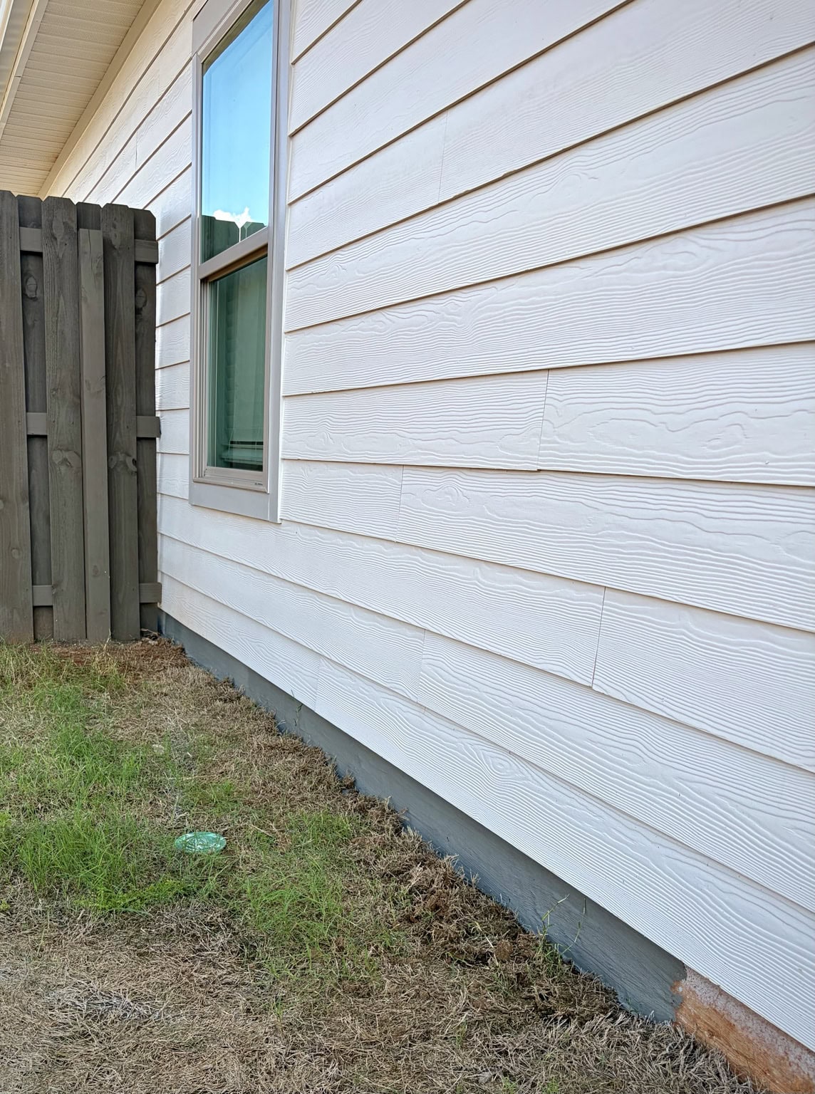 Foundation parging and exposed aggregate honeycomb repair in Huntsville Alabama