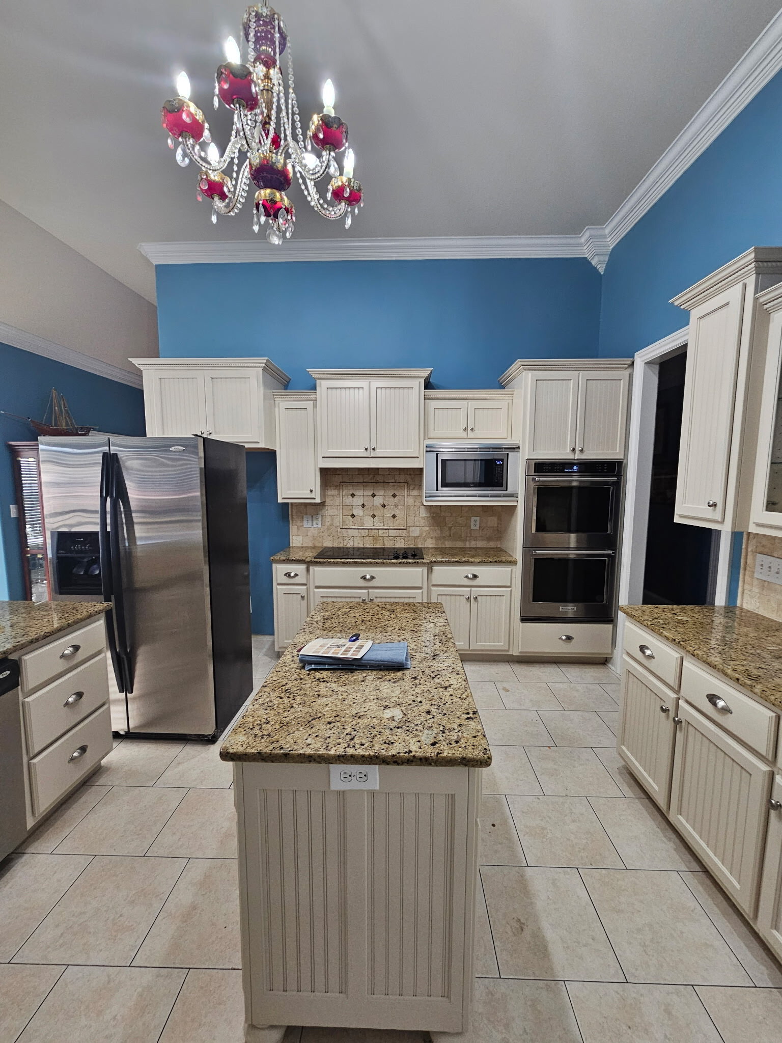 Kitchen cabinet painting before and after in Owens Cross Roads Alabama