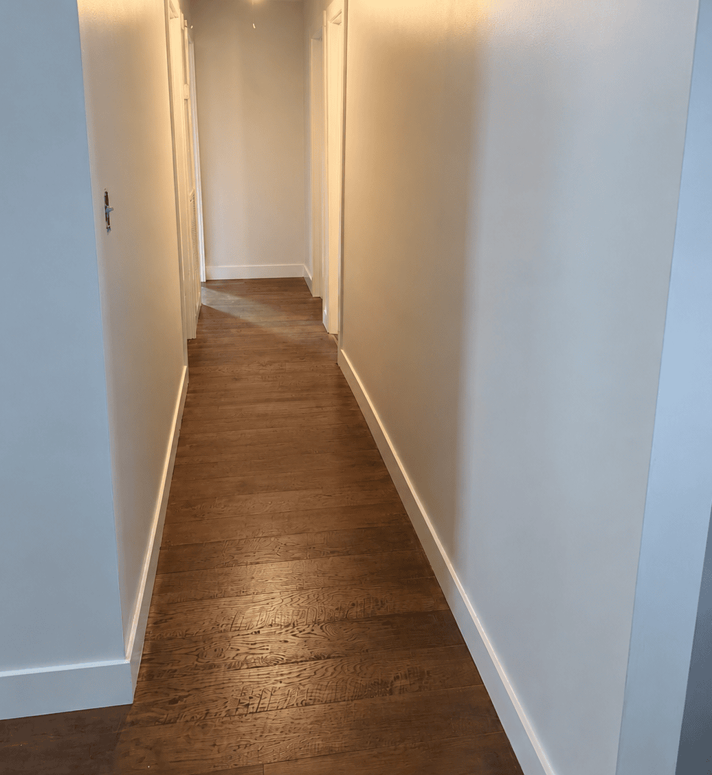 Laminate flooring installation with baseboards and interior doors in Huntsville Alabama